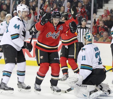 CALGARY;  DECEMBER 6, 2014  -- Calgary Flames Curtis Glencross celebrates a gaol on San Jose Sharks netminder Antti Niemi during their game at the Scotiabank Saddledome in Calgary on December 6, 2014.
(Leah Hennel/Calgary Herald)  
For Sports by Kristen Odland