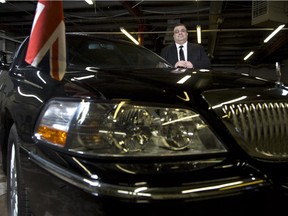 Cam Naghshineh, the general manager with Allied Limousines, poses with the car used to chauffeur Prince William and Kate in 2011. The car will be auctioned off to the highest bidder with the proceeds going to the Children's Make A Wish Foundation in Calgary, on December 10, 2014.