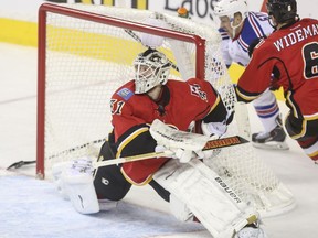 Calgary Flames goalie Karri Ramo stops a wrap-around shot during the second period on Tuesday night.