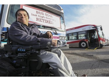 Mark Flores, member of Access Calgary Advisory Committee, visits Calgary Transit as it displays its last high-floor bus, which it is retiring today and finally making its entire bus fleet 100 per cent accessible in Calgary, on December 18, 2014. Flores says this is an exciting step towards full inclusion as Calgarians.