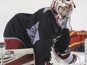 Former Canadian women's nationa team goalie Lesley Reddon joined the Flames for practice at the Saddledome on Thursday, replacing a sick Karri Ramo.