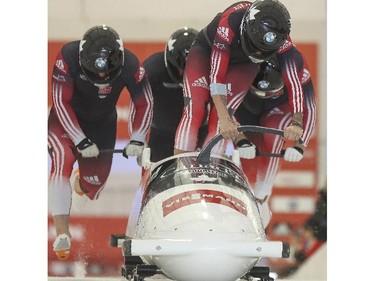 Kaillie Humphries competes with the men at the four men bob World Cup at Canada Olympic Park in Calgary, on December 20, 2014.