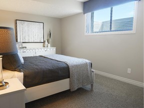 A basement suite bedroom from a showhome in northeast Calgary, by Trico Homes.