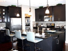 The kitchen in the Berkshire II show home by Sterling Homes in Nolan Hill.