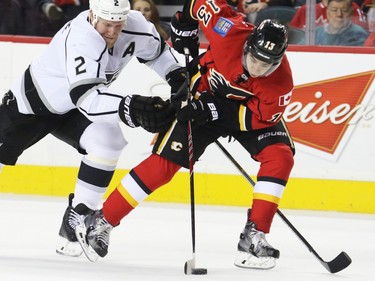 Gavin Young, Calgary Herald
CALGARY, AB: DECEMBER 29, 2014 - The Calgary Flames' Johnny Gaudreau tangles with  the Los Angeles Kings' Matt Greene during first period action in Calgary.
(Gavin Young/Calgary Herald)
(For Sports section story by Scott Cruikshank) Trax# 00056721A