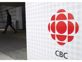 A man leaves the CBC building in Toronto, April 4, 2012.