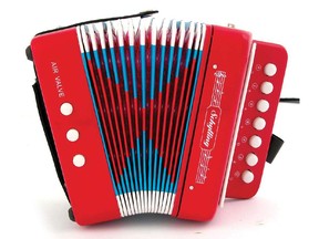 You're never too young to learn the accordion. Schylling accordion.