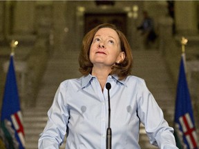 Alberta Premier Alison Redford announces her resignation in Edmonton, Alberta on Wednesday March 19, 2014. Redford has been struggling to deal with unrest in her Progressive Conservative caucus over her leadership style and questionable expenses.