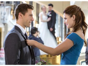 Andrew Walker and Erica Durance in Wedding Planner Mystery. Walker plays a reporter hot on the trail of the truth in the telefilm, which airs December 29 on CTV.