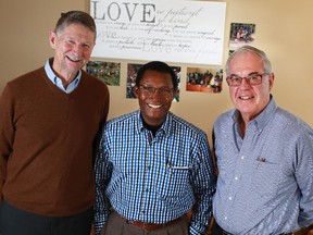 From left, Ross Weaver, co-founder of Old Guys in Action, Dr. Charles Mulli, founder and CEO of Mully Children's Family, and Frank Tilly, executive director of the organization, were photographed in Calgary on Wednesday December 10, 2014.
