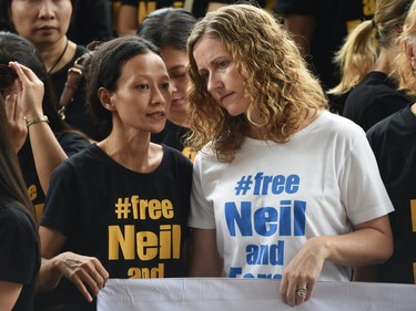 Tracy Bantleman, right, wife of accused Canadian teacher Neil Bantleman, listens to Siska Tjiong, wife of co-accused Indonesian teaching assistant Ferdinand Tjiong, during a rally to support their husbands at the South Jakarta court in 2014.