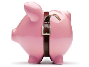 Belt tightening piggy bank illustration. istockphoto/Michael Balderas photo