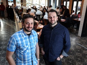 Brothers Russ and Chris Prefontaine enjoy the success of their new business, Corbeaux Bakehouse on December 23, 2014.