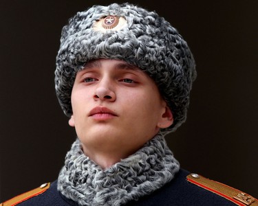 A member of the Russian honour guard stands at attention in the mountain Olympic village in Sochi, Russia on March 4, 2014.