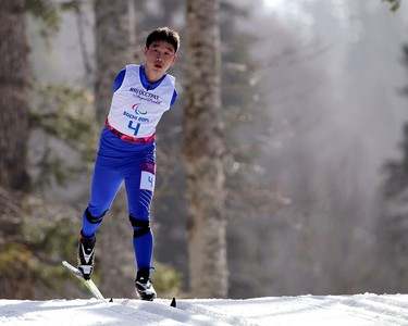 Haitao Du of China skis during the men's 20km standing cross-country skiing race at the Paralympic Winter Games on March 10, 2014 in Sochi, Russia.