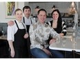Black Pig Bistro owners, from left, chefs Alison MacNeil,  John Michael MacNeil, Larry and Denise Scammell in the new Bridgeland restaurant.(Colleen De Neve/Calgary Herald) (For lifestyles story by John Gilchrist) 00061288A SLUG: 9999-Off the Menu