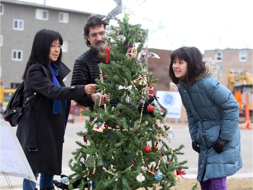 Garland, star, gloves and presents adorn public Sunnyside Christmas