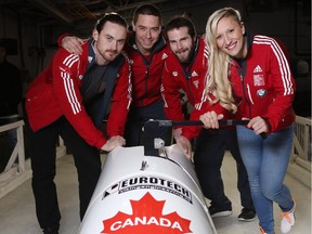 Kaillie Humphries, right, poses for a photo at the Ice House in Calgary, with her team from left, Dan Dale, Joe Nemet and D.J. McClelland, before they race together this weekend at Canada Olympic Park on the World cup for the first time.