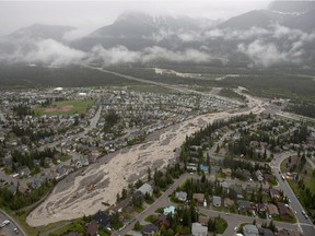 Cougar Creek rips through Canmore  during heavy flooding on June 21, 2013.