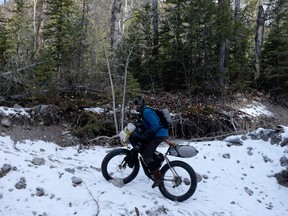 Doug Dunlop rides a fat bike in the Alberta Rockies.