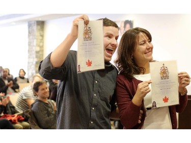 Jose Neto and his wife Roberta get their Canadian citizenship during a ceremony at Harry Hays in Calgary on December 5, 2014. Jose was blinded in after being caught as an innocent bystander in a downtown shooting.