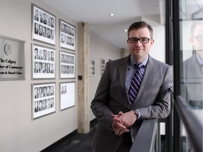 Adam Legge, president and chief executive of the Calgary Chamber of Commerce poses for a photo in their new offices in Calgary on April 29, 2014.