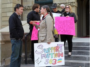 A group of protesters demonstrates last spring at the MacDougall Centre in favour of gay-straight alliances.