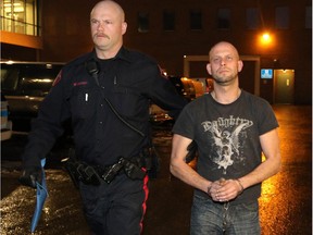 Allan Shyback is taken into custody in Calgary on December 6, 2014, charged with second degree murder and indignity to a human body.