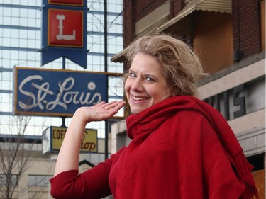 Cynthia Klaassen, president of the Calgary Heritage Initiative Society, is pleased with the restoration of buildings like the St. Louis Hotel as part of the East Village revitalization plan. She is pictured i front of the building Tuesday December 9, 2014.