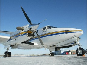 A government King Air B350 sits on the tarmac at City Centre Airport.