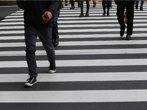 Pedestrians should wait to get to their destinations so they don't get hurt texting while walking.