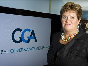 Arden Dalik is the managing director Western Canada for Global Governance Advisors poses for a photo in her home on Friday, August 16, 2013. ( Tijana Martin/ Calgary Herald) For Business story by Derek Sankey. Trax # 00047634A