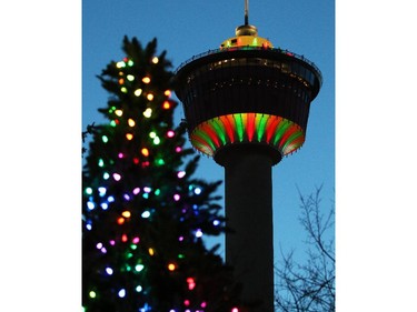 The Calgary Tower shows its Christmas colours at dusk on Thursday Dec. 18, 2014.