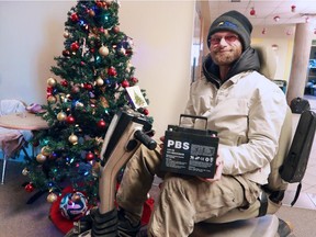 Calgary Drop-In Centre client Shane Friday was overwhelmed when he received desperately needed new batteries for his scooter as part of the Drop-In Centre's annual Christmas Wish List event. Donors provided over 750 gifts to clients in the annual Christmas Wish List event who each submit a wish for items of about $50. Shane's two new batteries provided by a donor are worth $200 each.