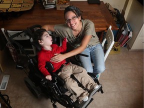 Nicole Daugherty and her three-year-old son Izrahia can enjoy Christmas after the Alberta government reversed its decision to claw back her support payments, on December 24, 2014.