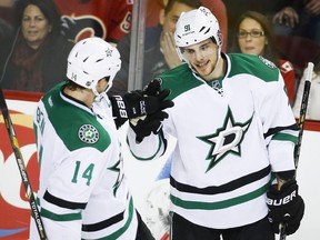 Dallas Stars' Tyler Seguin, right, celebrates a goal with teammate Jamie Benn in this file photo.