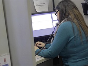 FILE PHOTO: Volunteers and staff man the Distress Centre's 24-hour crisis line and online chat room.