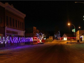 High River's downtown shines with Christmas decorations volunteers put up after last year's flood. Reader says memories of their help make this Christmas merry, too.