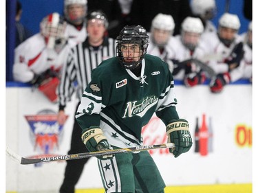 Calgary Northstars defenceman Shadee Merhi kept an eye on the play against the Lethbridge Hurricanes during their Mac's AAA Midget Tournament at Max Bell Arena on December 27, 2014.