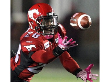 Calgary Stampders defensive back Brandon Smith comes up with an interception in the fourth quarter of their rout of the Saskatchewan Roughriders at McMahon Stadium Friday October 24, 2014.