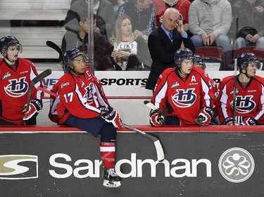 A dejected Lethbridge Hurricanes bench looked on after the Calgary Hitmen scored their seventh goal of the game during WHL action at the Scotiabank Saddledome on December 30, 2014.