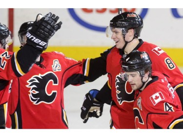 Calgary Flames Joe Colborne, right, celebrates his goal on the Edmonton Oilers during their game at the Scotiabank Saddledome in Calgary on December 31, 2014.