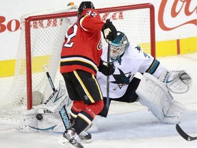 Calgary Flames forward Paul Bryon is denied on the doorstep by San Jose Sharks goalie Antti Niemi during Saturday's game.