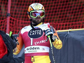 Jan Hudec of Canada looks on after he crashed during the FIS Alpine World Cup Men's Downhill event in Val Gardena, Italy, on Friday. The Calgarian suffered a bone bruise in his knee and will miss Saturday's Super-G.
