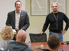 Fresh Start Recovery Centre executive director Stacey Petersen, left, and addictions counsellor Tony Kokol talk with clients.