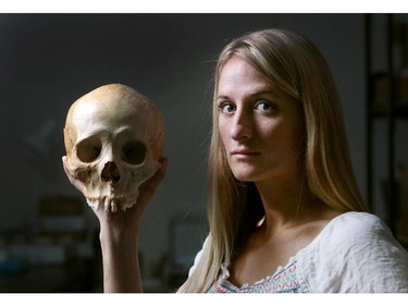 University of Calgary Anthropology and Archaeology Phd student Adrianne Offenbecker has been involved in a research project in Paquime in Northern Mexico. She is studying the remains, mainly teeth, discovered there which shows signs of human violence like human sacrifice and possibly cannibalism. She was photographer in a lab at the university on October 7, 2014.