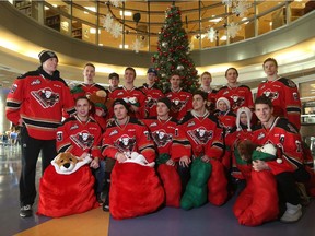 The Calgary Hitmen visit the Children's Hospital after Sunday's successful Teddy Bear Toss to hand out stuffies to the children on Monday morning.