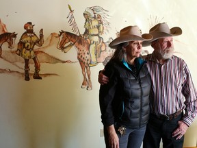 Gloria and Stan Cowley, photographed in 2014, standing in one of the guest rooms in the lodge at Rafter Six Ranch.