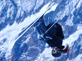 Freestyle skier Clare Lambert does a front flip on the bottom air during training camp in Zermatt, Switzerland.