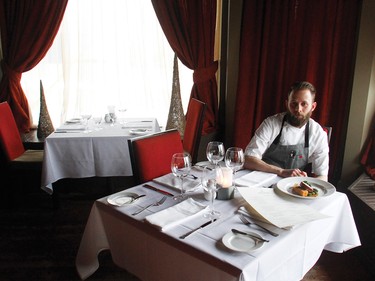 Chef Brian Diamond with porchetta at Il Sogno restaurant in Bridgerland.